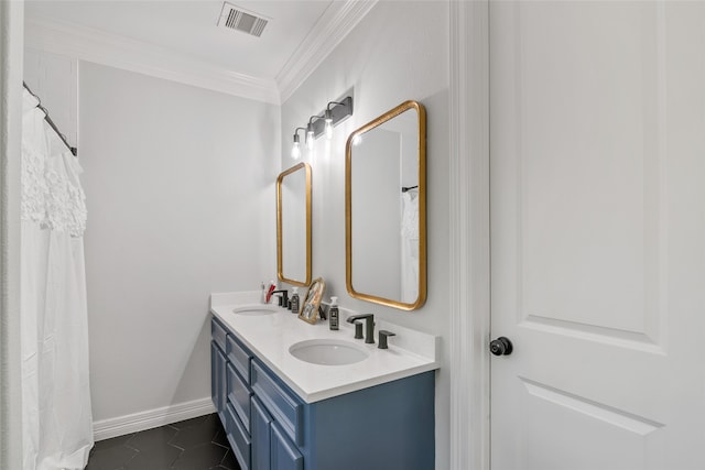 bathroom featuring ornamental molding, vanity, and tile patterned floors