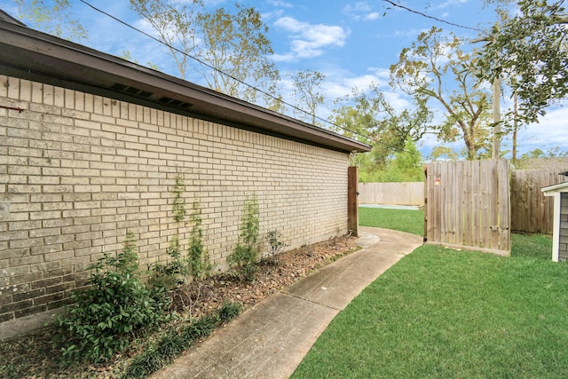 view of home's exterior with a lawn