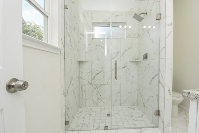 bathroom featuring an enclosed shower and toilet