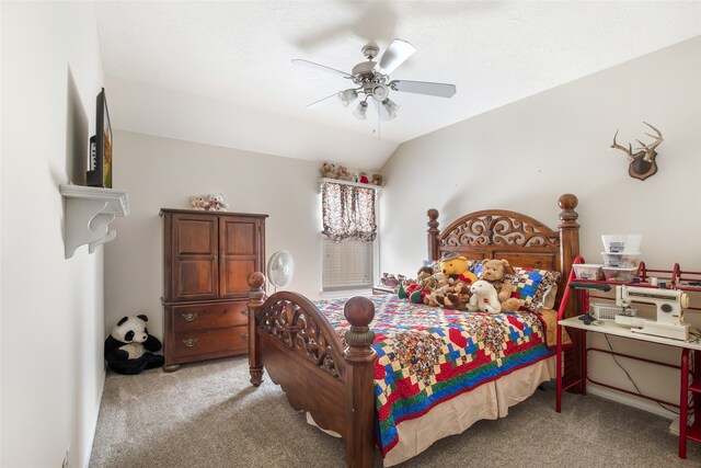 bedroom featuring ceiling fan, vaulted ceiling, and light colored carpet