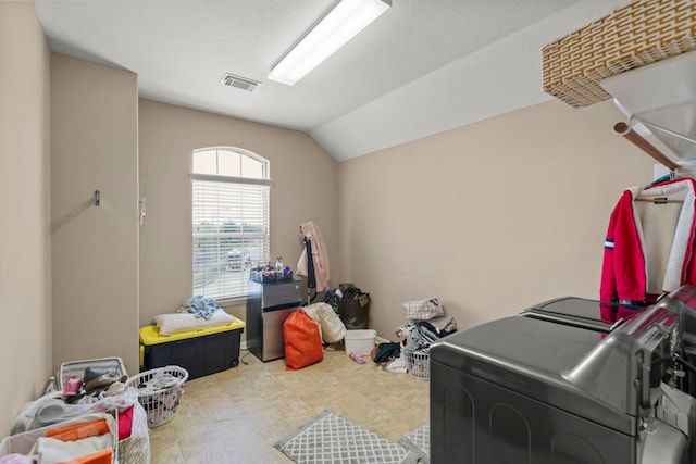 laundry area with separate washer and dryer