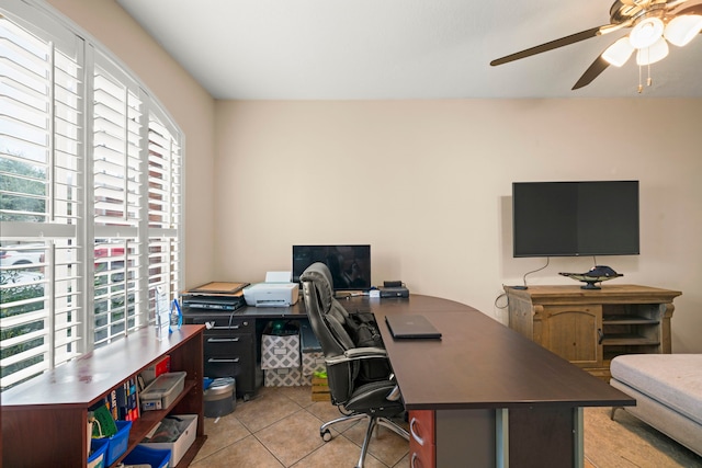 tiled home office with ceiling fan