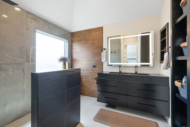 bathroom with vanity, tile patterned floors, and walk in shower