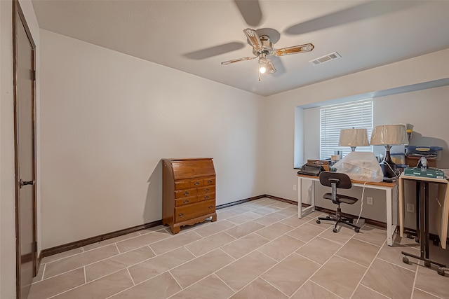 office area with ceiling fan and light tile patterned floors