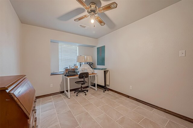 tiled office with ceiling fan