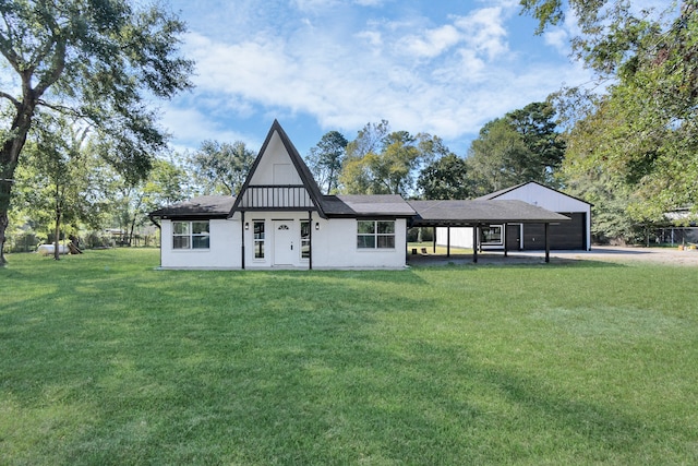 view of front of home featuring a garage and a front lawn