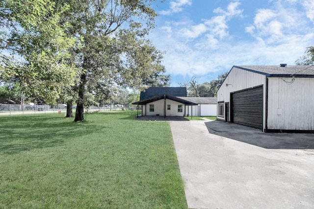 view of yard with a garage