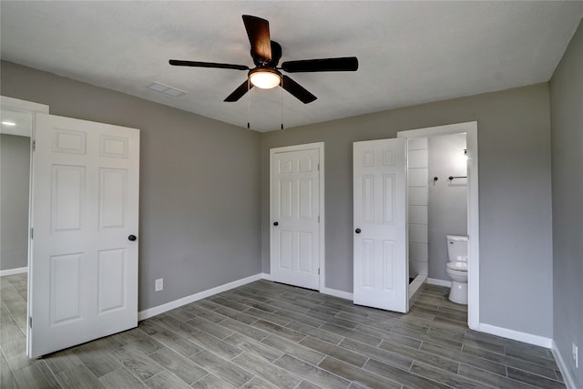 unfurnished bedroom with ceiling fan, light hardwood / wood-style flooring, and ensuite bath