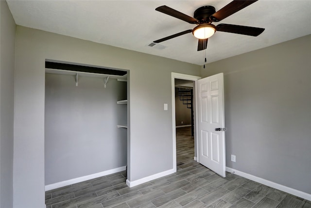 unfurnished bedroom with ceiling fan, a closet, and light hardwood / wood-style flooring