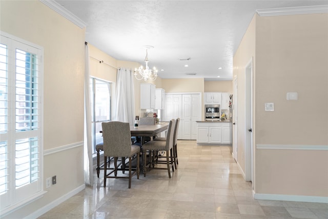 dining room featuring plenty of natural light, ornamental molding, a chandelier, and a textured ceiling