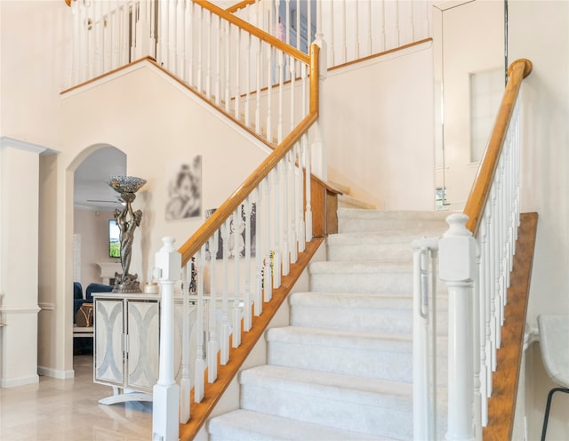 stairs with a towering ceiling