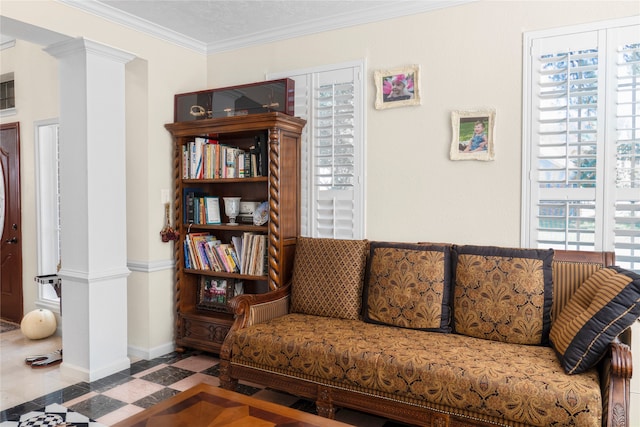 sitting room featuring tile patterned floors, crown molding, ornate columns, and a wealth of natural light