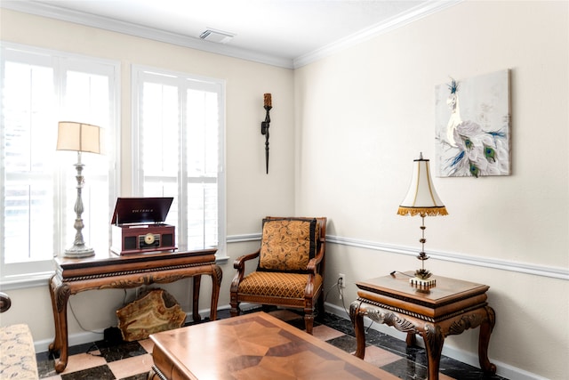 living area with crown molding