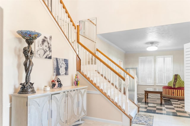 staircase with crown molding