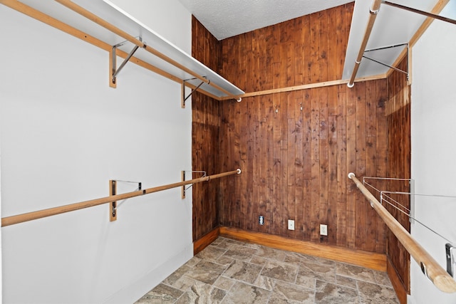 603 Hardeman St, Sealy, TX 77474 - spacious closet featuring stone finish flooring