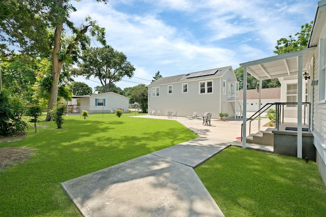 603 Hardeman St, Sealy, TX 77474 - view of yard featuring a patio and fence