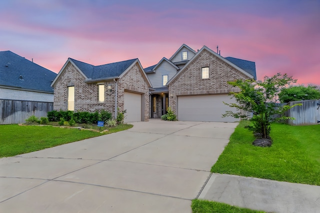 view of front of home with a lawn