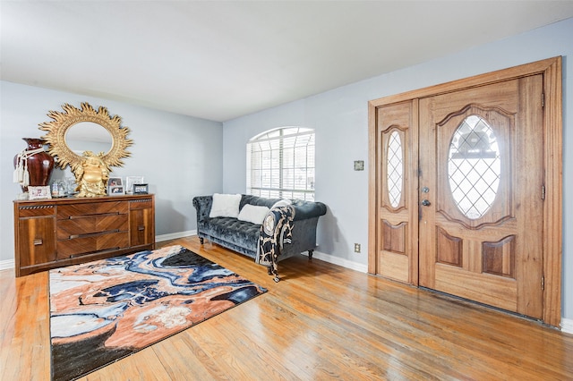 entrance foyer with hardwood / wood-style floors