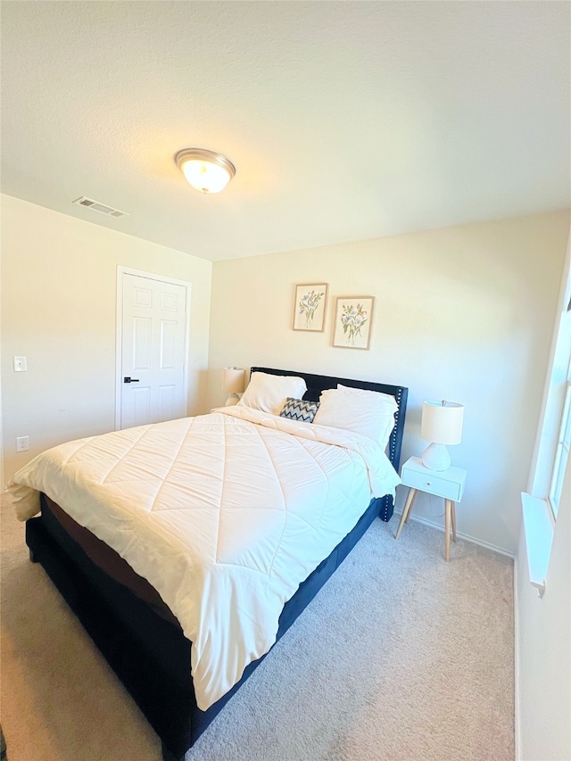 bedroom featuring carpet flooring