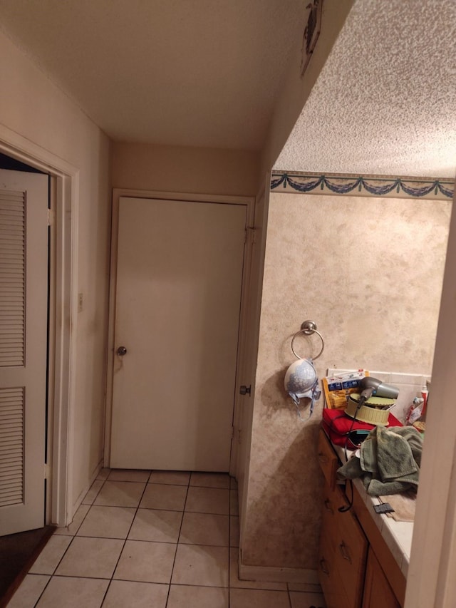 bathroom featuring tile patterned flooring