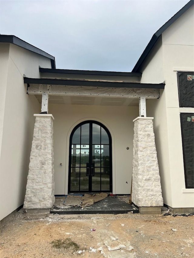 view of exterior entry with french doors