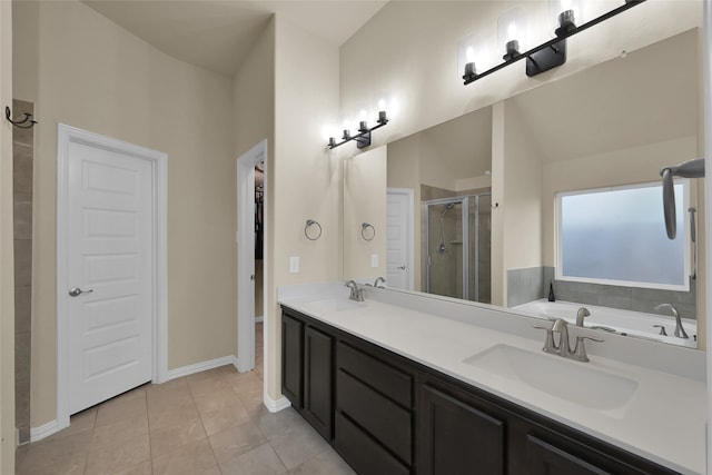 bathroom featuring tile patterned flooring, plus walk in shower, lofted ceiling, and vanity