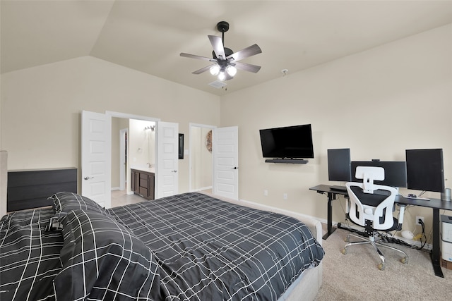 carpeted bedroom featuring lofted ceiling, ceiling fan, and ensuite bathroom