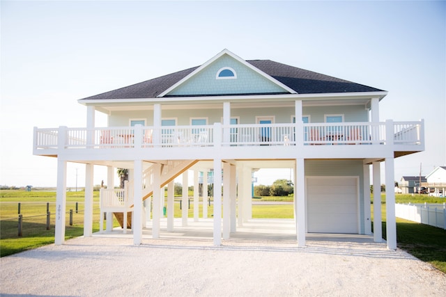 coastal inspired home with a garage