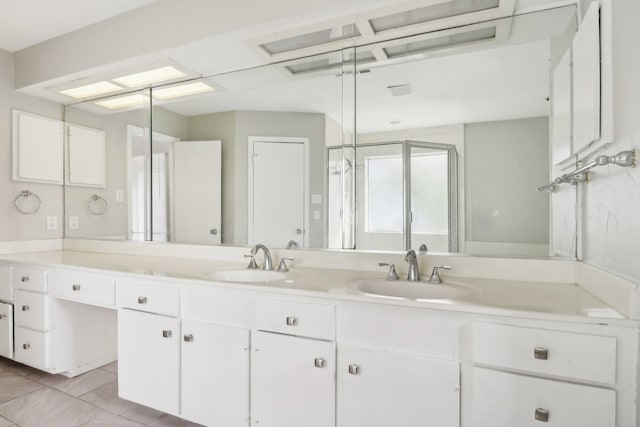 bathroom with vanity and tile patterned floors