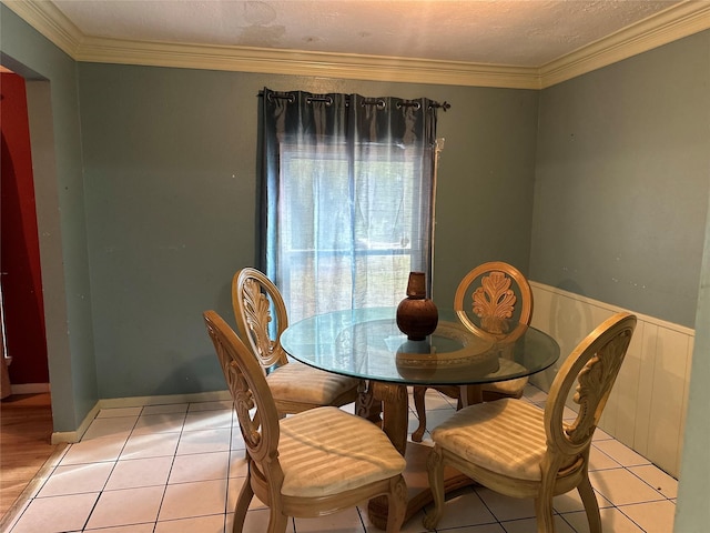 12419 Longbrook Dr, Houston, TX 77099 - dining room with crown molding and a wainscoted wall