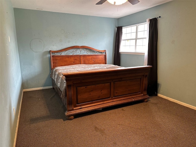 12419 Longbrook Dr, Houston, TX 77099 - carpeted bedroom featuring baseboards and ceiling fan