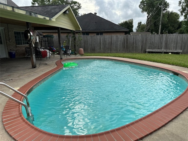 12419 Longbrook Dr, Houston, TX 77099 - view of pool featuring a fenced in pool, a fenced backyard, and a patio area