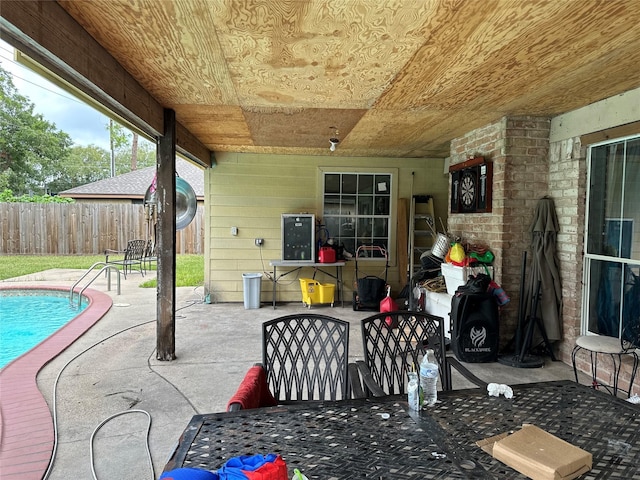 12419 Longbrook Dr, Houston, TX 77099 - view of patio / terrace with fence and a fenced in pool