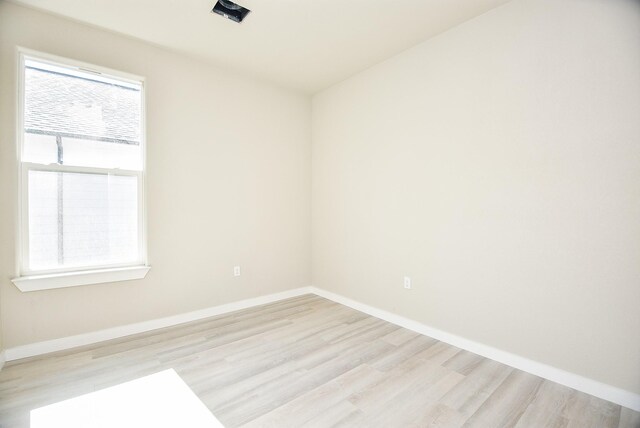 100 S 12 Th St, West Columbia, TX 77486 - spare room with baseboards and light wood finished floors