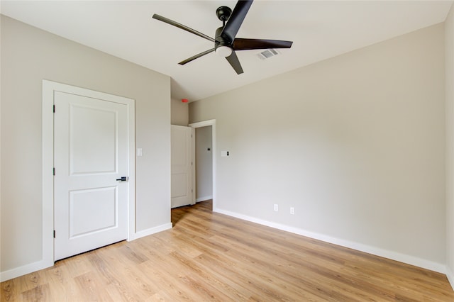 unfurnished bedroom featuring ceiling fan and light hardwood / wood-style flooring