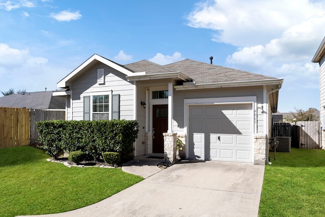 ranch-style house with a garage and a front lawn