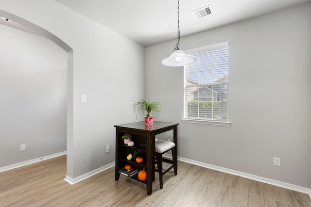 dining room with light hardwood / wood-style floors