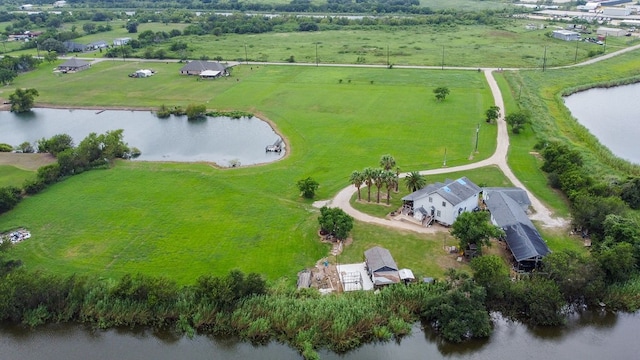 bird's eye view featuring a rural view and a water view