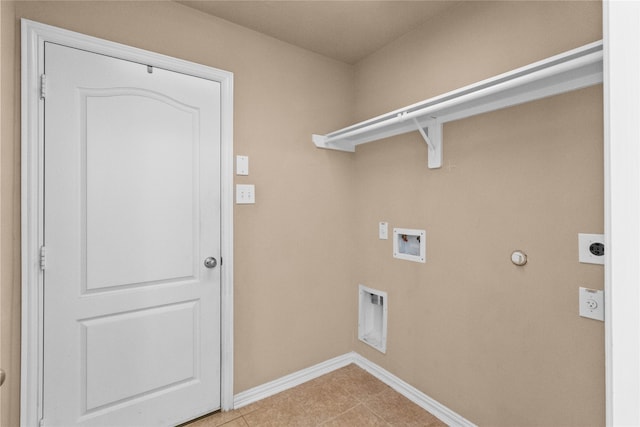 clothes washing area with hookup for a washing machine, hookup for a gas dryer, light tile patterned floors, and hookup for an electric dryer