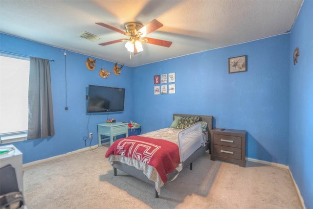 bedroom featuring carpet flooring and ceiling fan