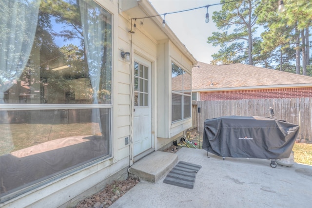 exterior space featuring a grill