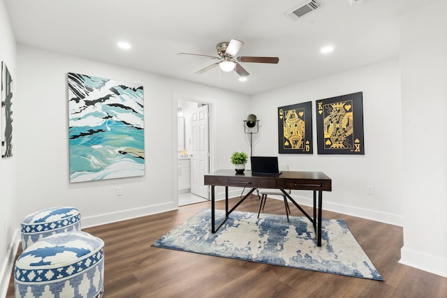 office space with ceiling fan and dark hardwood / wood-style floors