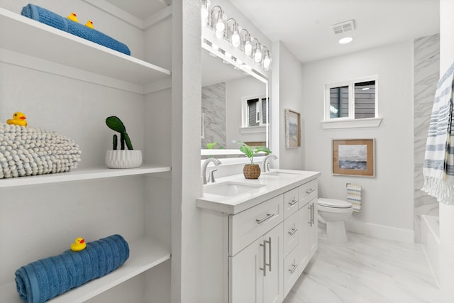 bathroom featuring a shower with curtain, vanity, and toilet