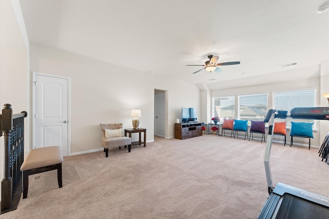 living area featuring ceiling fan and light colored carpet