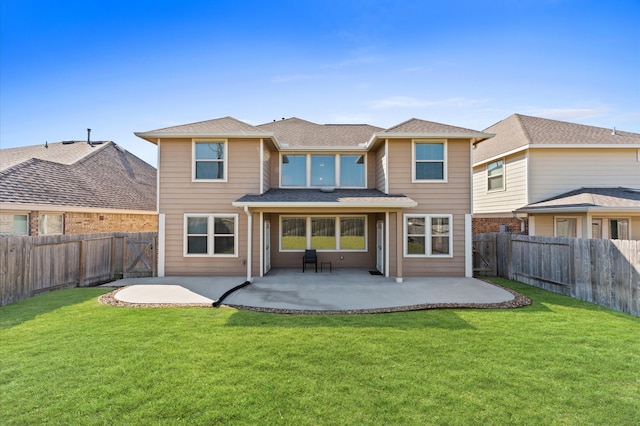 back of property featuring a yard and a patio area