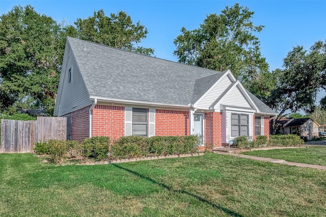 view of front of house with a front lawn