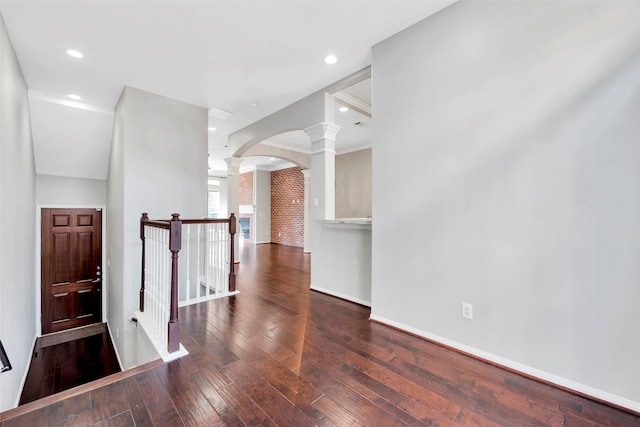 unfurnished room featuring dark hardwood / wood-style flooring