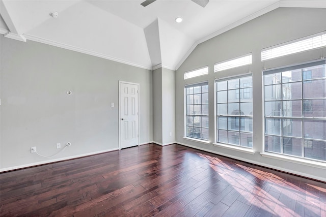 unfurnished room with dark hardwood / wood-style flooring, crown molding, ceiling fan, and lofted ceiling