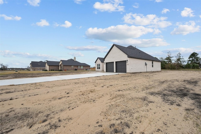 exterior space with a garage