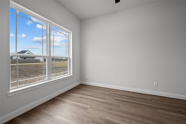 unfurnished room featuring light hardwood / wood-style floors